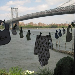 Hanging out baby laundry from the bridge