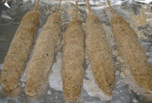 Pork cabobs after second dipping in bread crumbs